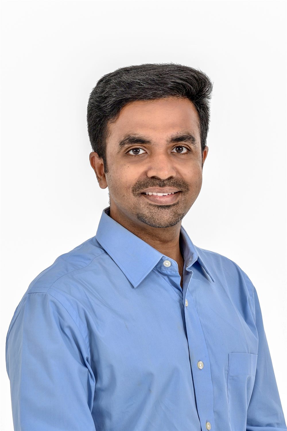 Portrait of Dr. Naveen Mohanraj, FRCPC pediatrician in Langley, BC